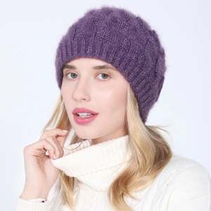 Detail of purple cable knit beret with subtle glitter thread on a female model