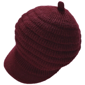 Close-up of dark red striped knit hat with thick fleece lining and pom-pom detail