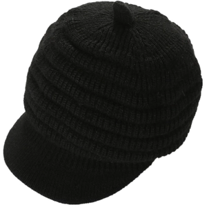 Detailed view of black cable-knit texture and brim on this warm winter newsboy cap