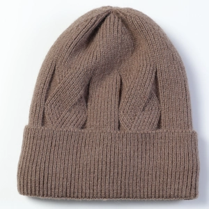 Detail shot of brown cable-knit beanie featuring thick ribbed cuff and cozy fleece lining
