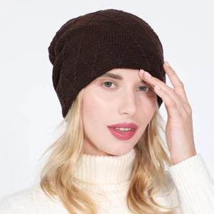 Close-up of deep brown diamond-patterned knit beanie with soft thermal texture