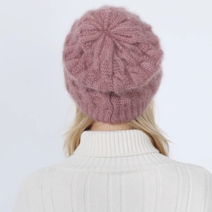 Detailed knit texture of pink mauve beret hat with subtle shimmer and soft fiber