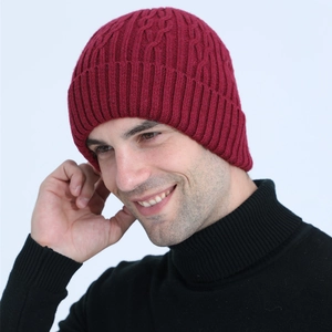 Men's dark red cable knit beanie hat with warm fleece lining and thick wool texture