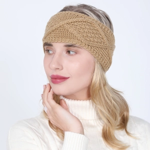 Detail of khaki cable knit headband featuring textured diamond pattern and soft yarn
