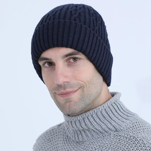 Men's navy blue cable knit beanie with warm fleece lining and ribbed cuff for winter