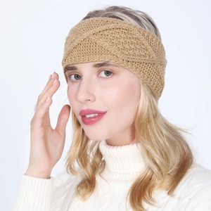 Detail view of khaki knitted headband with cable knit texture for women winter fashion