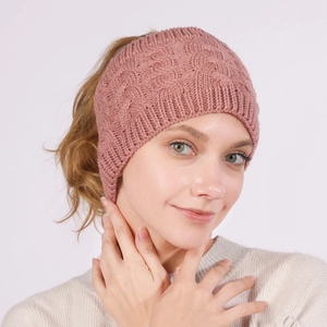 Detail of cable knit pattern and ponytail hole on dusty rose thermal headband