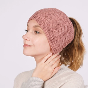 Detail of cable knit texture on dusky rose ponytail headband with ribbed edges