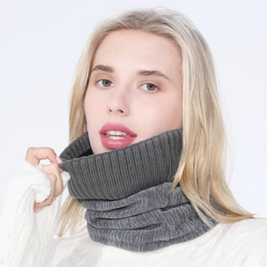 Close-up of a dark grey knit neck gaiter with a warm ribbed texture for winter
