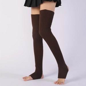 Detail of dark brown ribbed knit over-the-knee leg warmers with stirrup heel design