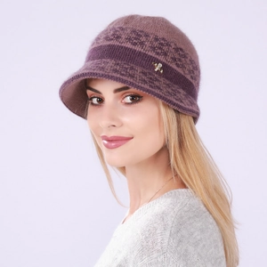 Close-up of lavender knit bucket hat featuring golden bee detail and striped texture