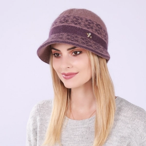 Close-up of a purple knitted wool hat with gold insect brooch and soft fuzzy texture