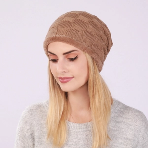 Detailed view of winter knitted beanie featuring grid texture and warm fleece lining