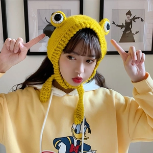Handmade yellow crochet frog hat with big eyes and warm earflaps for women