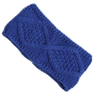 Macro detail of blue cable knit headband with thick textured diamond pattern for winter