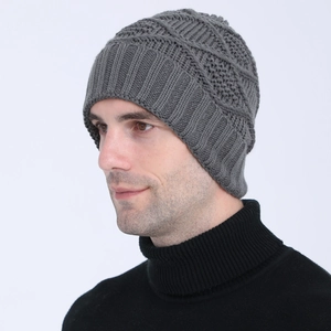 Men's grey knit beanie hat featuring thick texture and geometric patterns for winter warmth