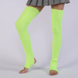 Detail view of neon green stirrup knit leg warmers for ballet and yoga on model