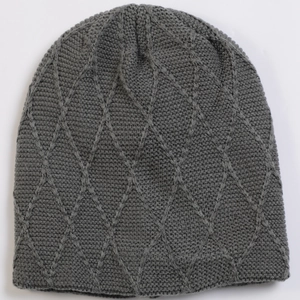 Detailed view of dark grey knitted beanie featuring 3D diamond lattice weave pattern