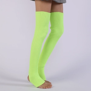 Detail of neon green ribbed knit fabric on over-knee stirrup leg warmers for yoga
