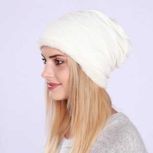 Detailed texture of white pleated knit beanie with thick thermal fleece lining side view