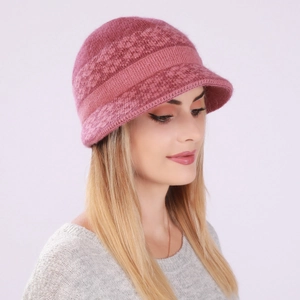 Detail view of pink knitted bucket hat with thick geometric texture and rolled brim