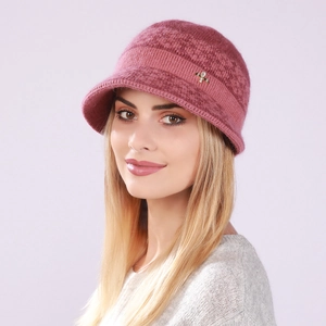 Detailed texture of dark pink knitted bucket hat with a sparkling dragonfly brooch