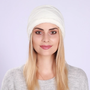Detail of white knit beanie with soft plush lining and ripple texture for winter warmth
