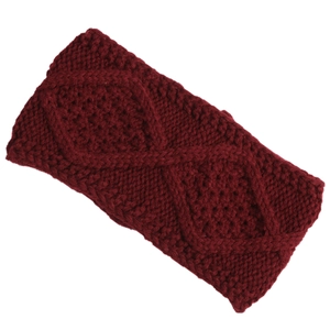Detail of cable knit pattern on dark red winter headband for women with high ponytail