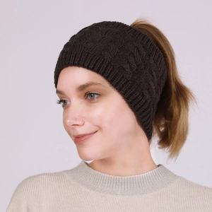 Detail showing deep brown thick cable knit texture on a thermal ear warmer headband