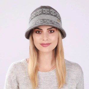 Close-up of gray knit visor hat with geometric patterns and golden bee ornament detail