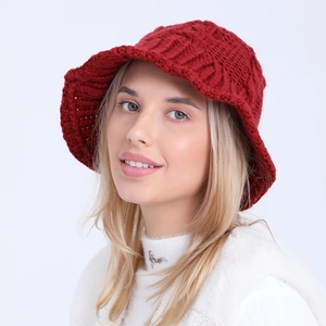 Women's knit cloche hat in dark red with thick braided texture for winter warmth