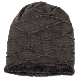 Detailed view of the thick plush lining and diamond knit pattern on this winter beanie