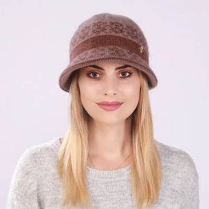 Close-up of knit winter bucket hat featuring geometric patterns and a gold bee emblem