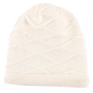 Close-up of white knitted beanie with wave texture and thick faux fur cuff detail