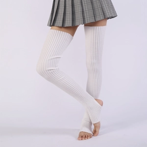 Close-up of white ribbed knit over-knee leg warmers with grey plaid pleated skirt
