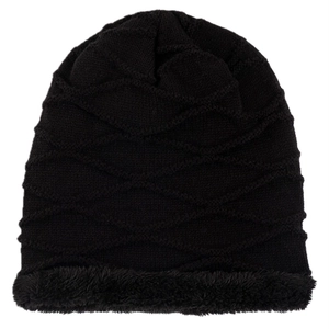 Close-up of black knitted winter hat with wave texture and warm fleece lining