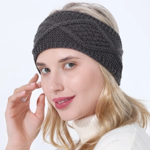 Women's dark grey cable knit headband with twist knot pattern for autumn winter warmth