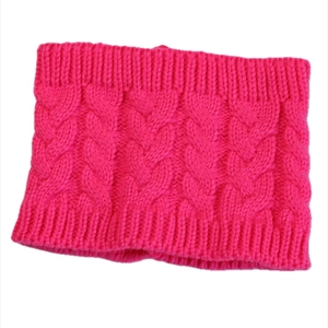 Detail of rose red cable knit headband showing thick braided texture and ribbed edges