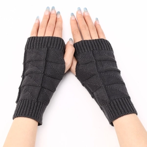 Detailed close-up of dark grey fingerless knit gloves featuring textured diamond pattern