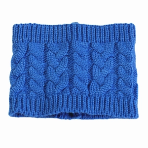 Detail of navy blue cable knit headband featuring ribbed edges and warm thick texture