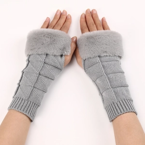 Light gray knitted fingerless gloves with faux fur cuffs and diamond pattern
