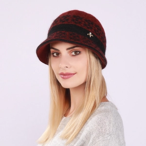 Close-up of winter knit bucket hat featuring vintage burgundy and black geometric jacquard