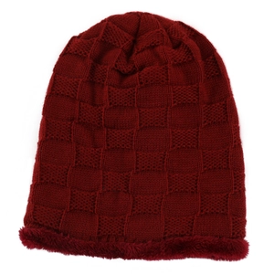 Detail of dark red checkered knit beanie with warm faux fur lining for winter wear