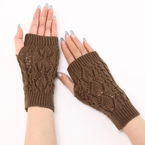 Detailed knit texture and leaf cutout pattern on dark brown fingerless arm warmers