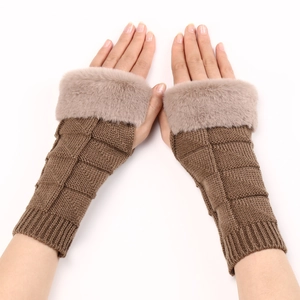 Close-up of brown knit fingerless gloves with waffle texture and faux fur trim