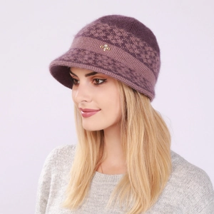 Detail of purple knitted wool hat with fleece lining and gold dragonfly brooch