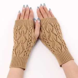 Detail of camel knitted fingerless gloves featuring hollow leaf pattern and soft wool texture