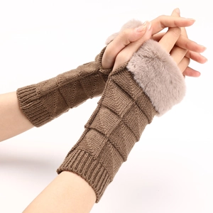 Detailed view of brown knitted fingerless gloves with soft grey faux fur cuffs