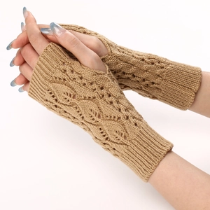 Detail view of camel knit fingerless gloves with elegant hollow leaf pattern design