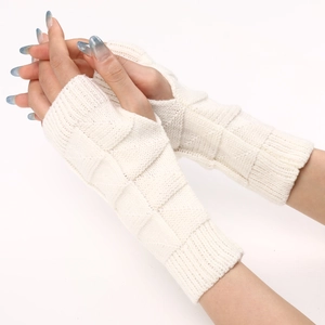 White knitted fingerless gloves with triangle pattern and thumb hole for winter warmth